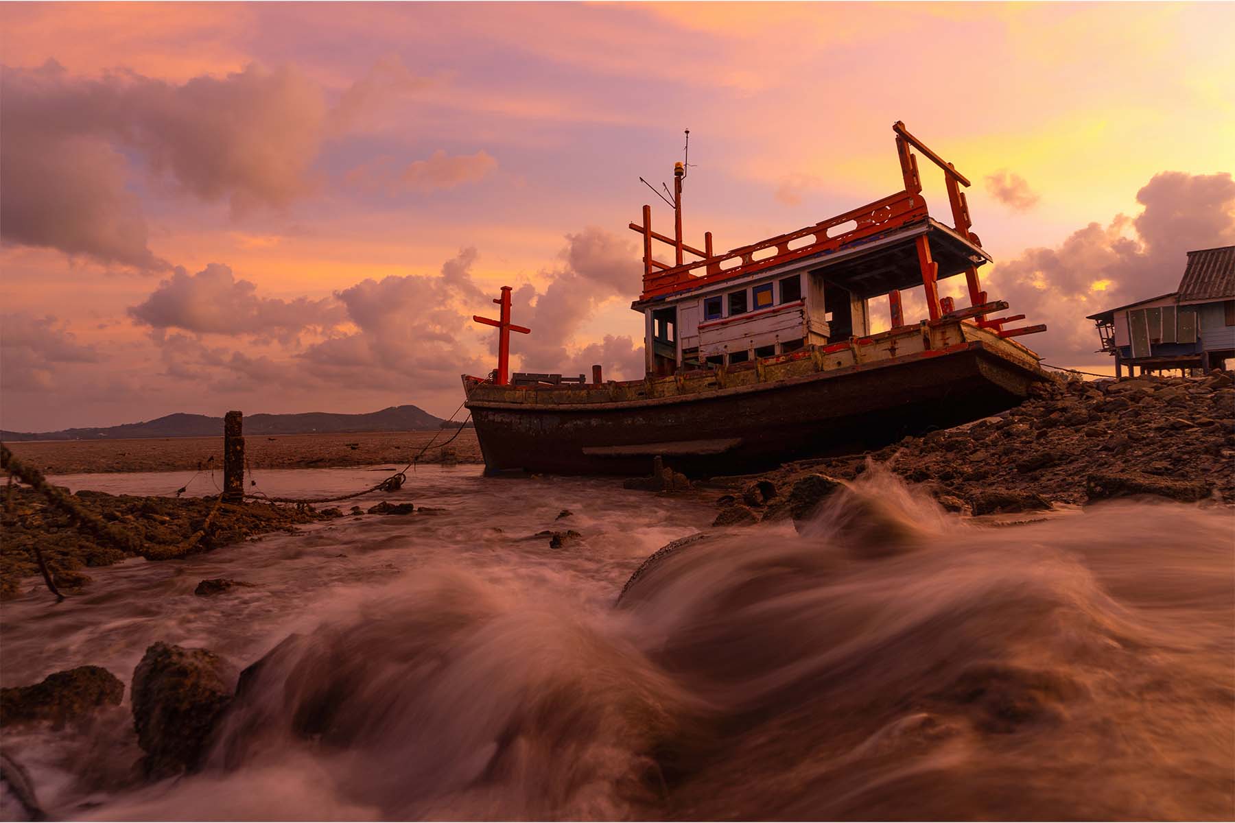 a wooden ship on a stormy sea